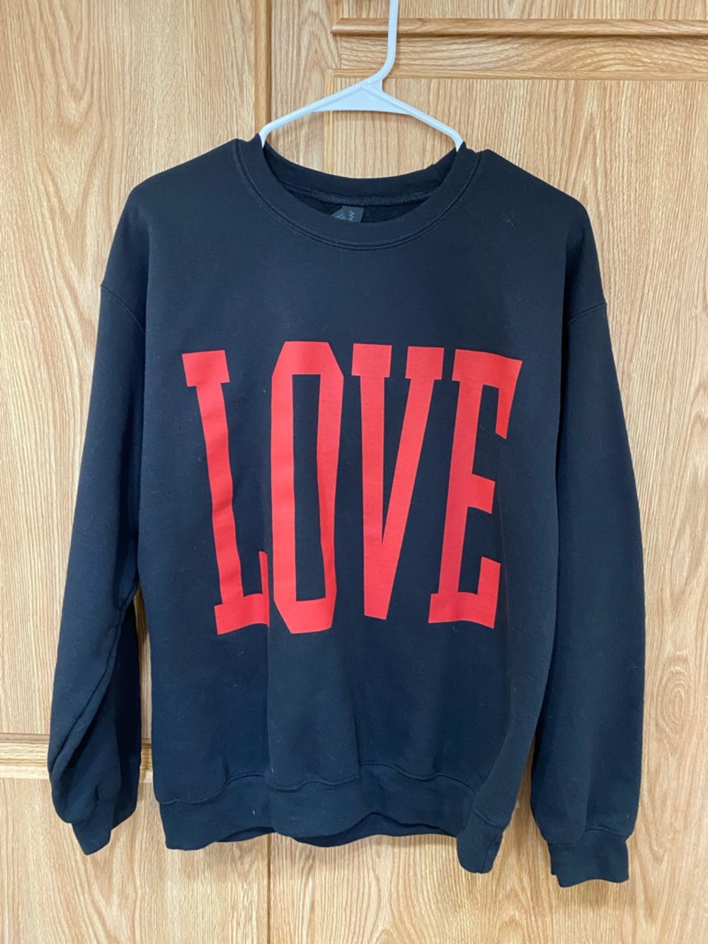 Gildan Black Crewneck Sweatshirt with Red LOVE Letters.